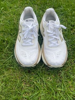 New Balance White Sneakers with Gold Trim